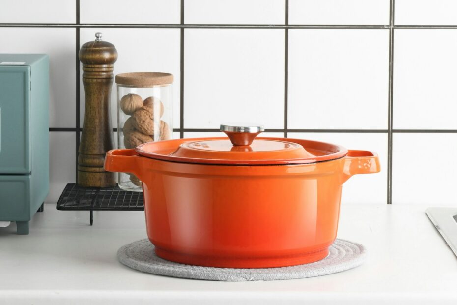 orange plastic container on white table